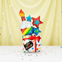 Colorful birthday-themed jumbo balloon including a cupcake, candles, and stars on a yellow background.