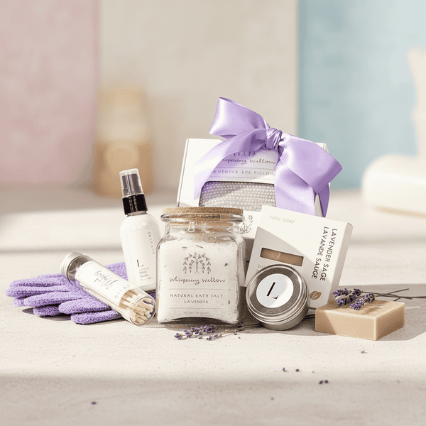 Lavender-themed gift set with bath salts, soap, and other items on a neutral background