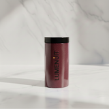 Lumenuit Colored Wax Pearls canister on marble, offering customizable candle experiences with eco-friendly, mess-free, versatile wax pearls for vibrant, long-lasting ambiance.