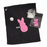 Peeps Bunny Golf Set: Includes a black towel, golf ball, zip pouch, and tees, all featuring the iconic pink bunny logo.