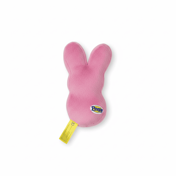 Peeps Plush Bunny - 5 Pink, Blue Tag: A soft, pink plush toy in Peeps bunny shape, featuring a blue Peeps logo tag and hard plastic emblem.