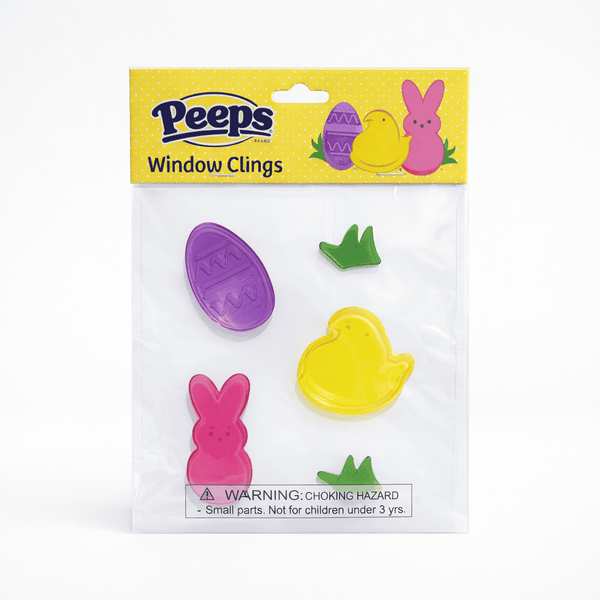 Peeps Window Clings: A set of five Easter-themed clings, including a chick, bunny, egg, and grass, in a sealed package with a safety warning.
