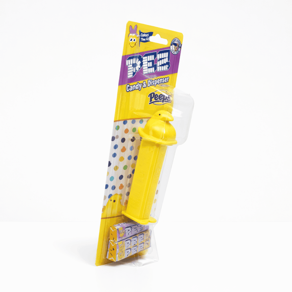 Peeps Chick PEZ Dispenser in factory-sealed package, featuring a yellow chick head and mini PEZ candy refills. Official Peeps merchandise, candy expired.